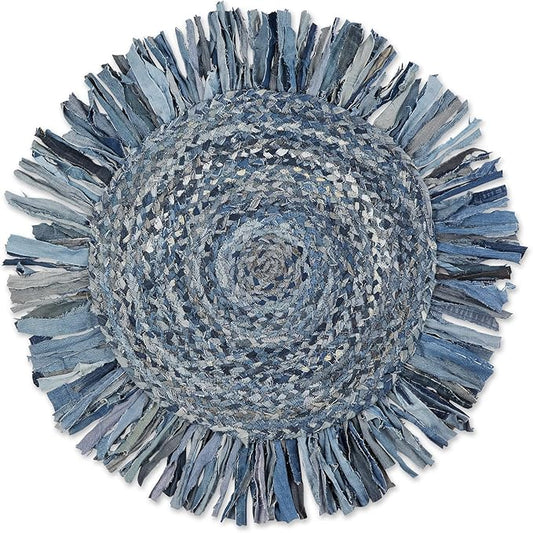 Round blue denim rug with frayed edges on a white background