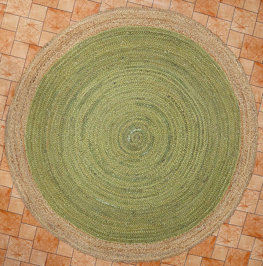 Round green braided rug on a tiled floor