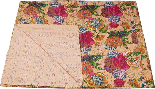 Colorful floral-patterned fabric with a plain corner on a white background