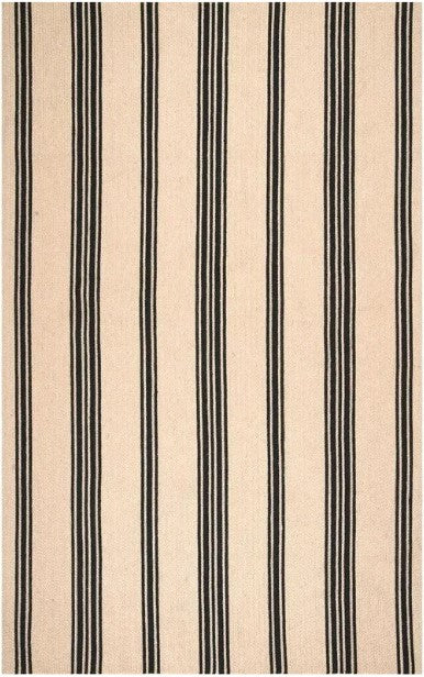Beige rug with black vertical stripes