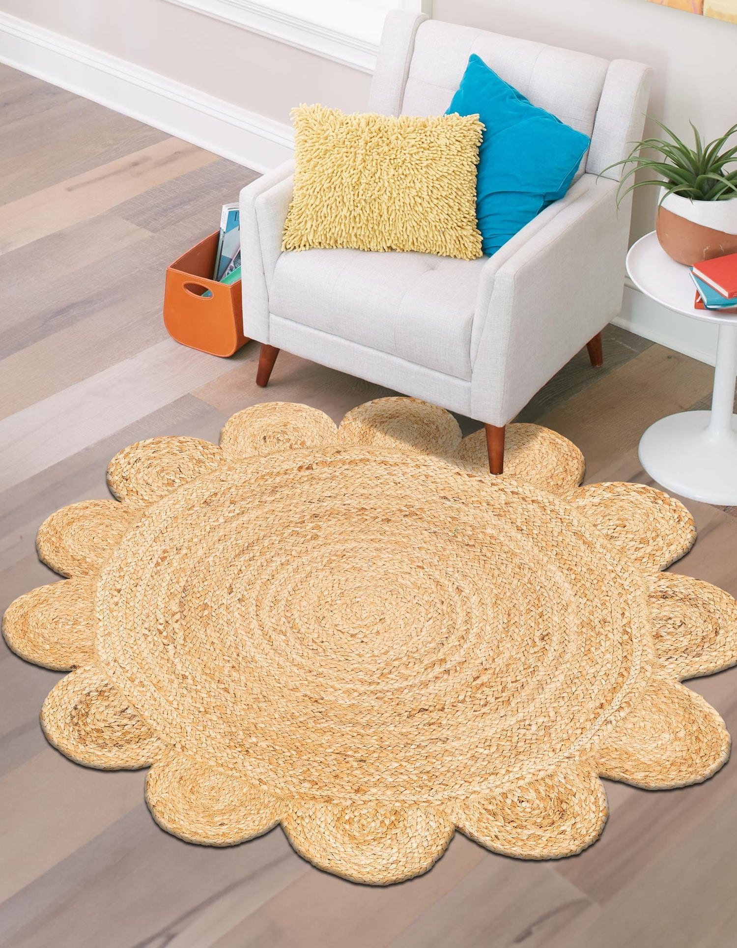 Natural jute round rug with flower design, soft beige color, perfect for adding warmth to any room.