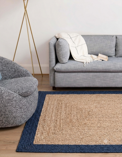 Natural Jute Area Rug with navy border, hand-braided runner style for indoor entryway and living room flooring