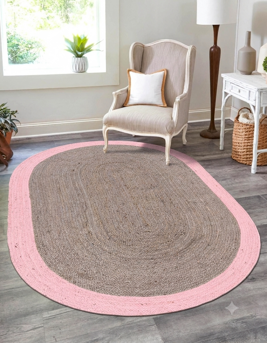Natural Jute Area Rug round rug in natural jute with pink border, indoor hallway and entryway area rug under a chair