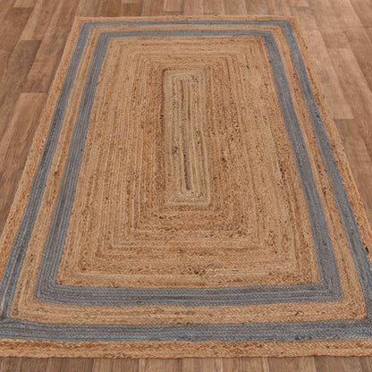 Natural jute area rug with blue stripes, rectangular shape, adding a rustic touch to any space.