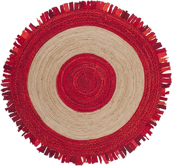 Round red and beige braided rug with fringed edge on a white background