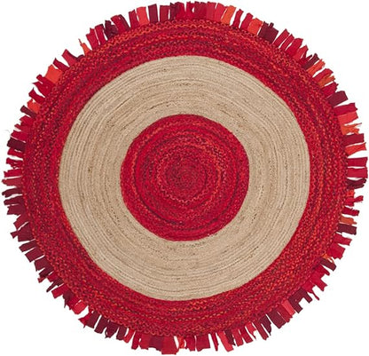 Round red and beige braided rug with fringed edge on a white background