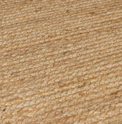 Natural jute area rug, woven design in beige, perfect for eco-friendly home decor.