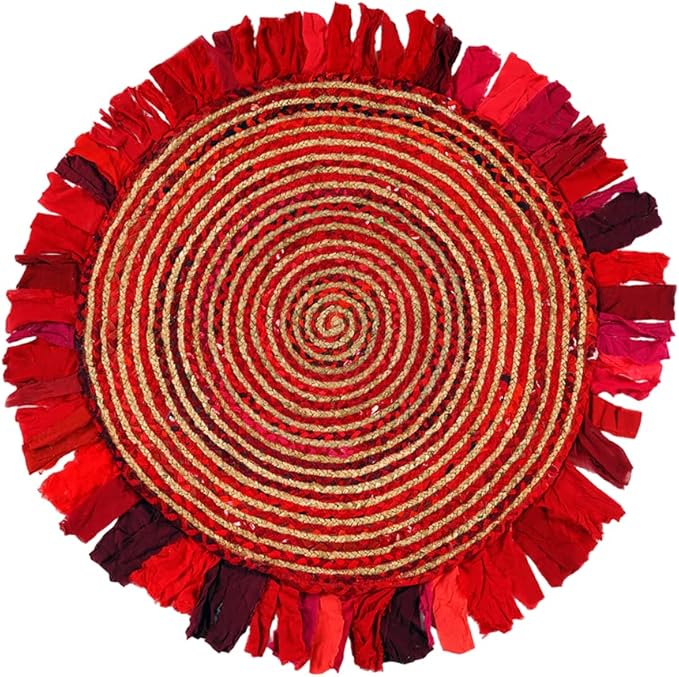 Round red and gold woven mat with fringed edge on a white background