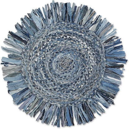 Round blue denim rug with frayed edges on a white background