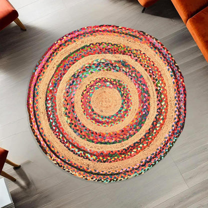 Natural Jute Area Rug in a vibrant circular design with colorful woven patterns — perfect for adding warmth to any space.