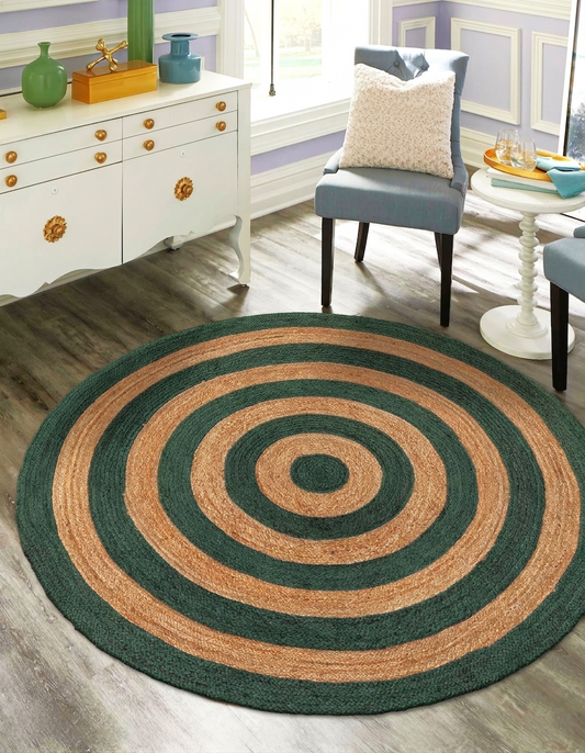 Natural Jute Area Rug Round Rug in green and tan concentric circles on wood floor in living room