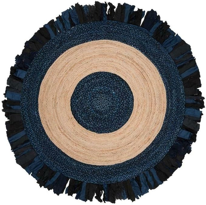 Round rug with blue and beige concentric circles on a white background