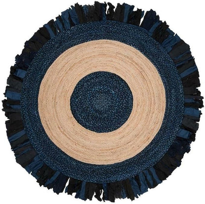 Round rug with blue and beige concentric circles on a white background