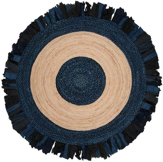 Round rug with blue and beige concentric circles on a white background