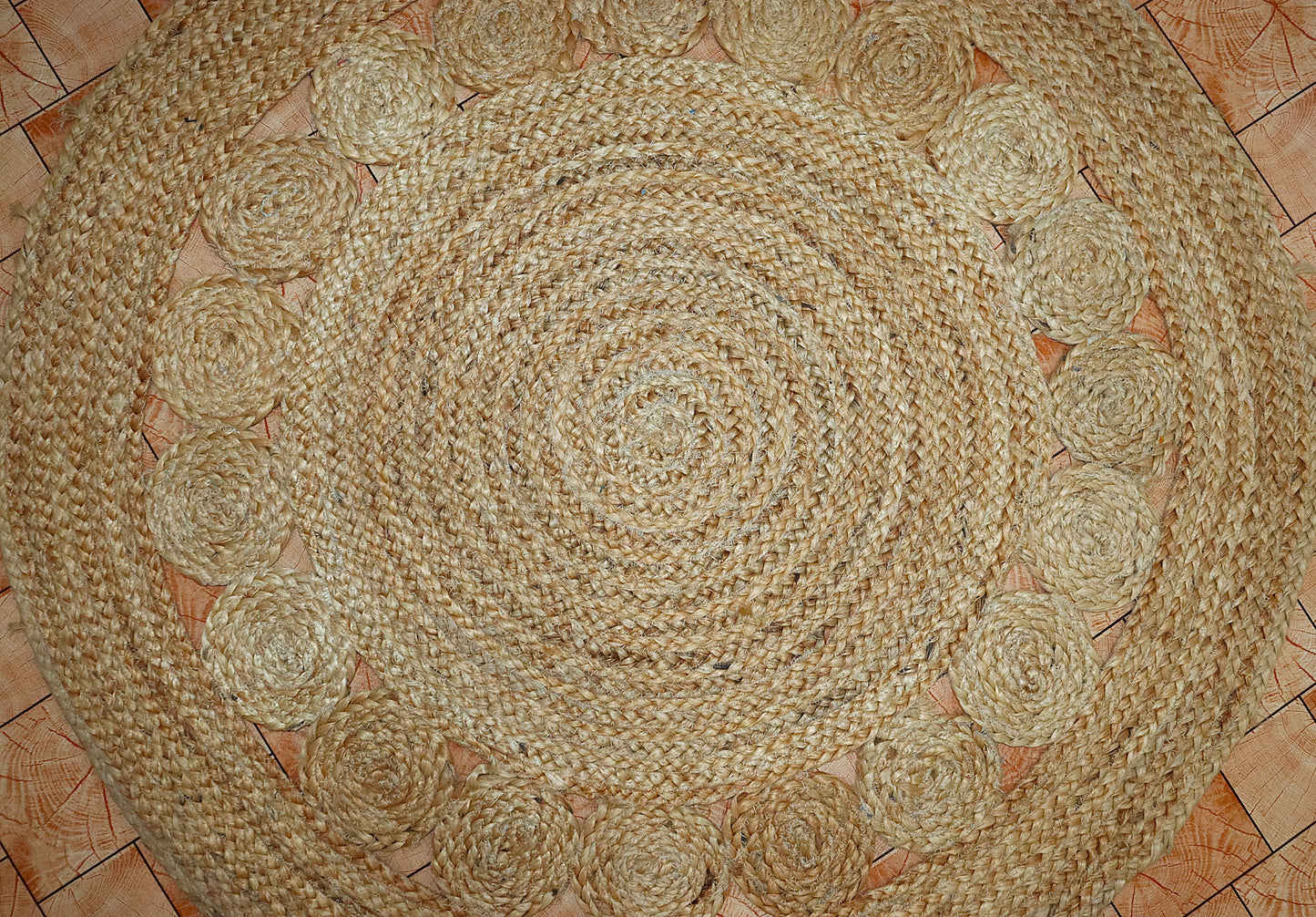 Round braided rug on a tiled floor