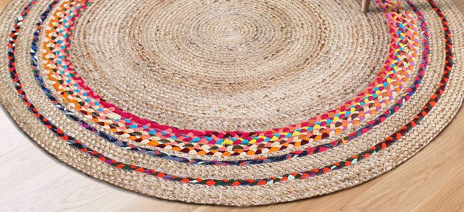 Natural Jute Area Rug featuring vibrant woven patterns, perfect as a round rug for adding texture to any space.