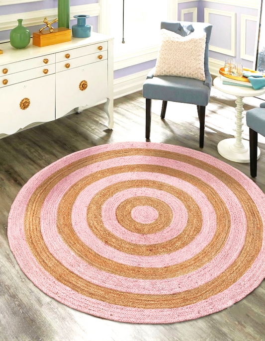 Natural Jute Area Rug Round Rug with pink and tan spiral design in living room floor