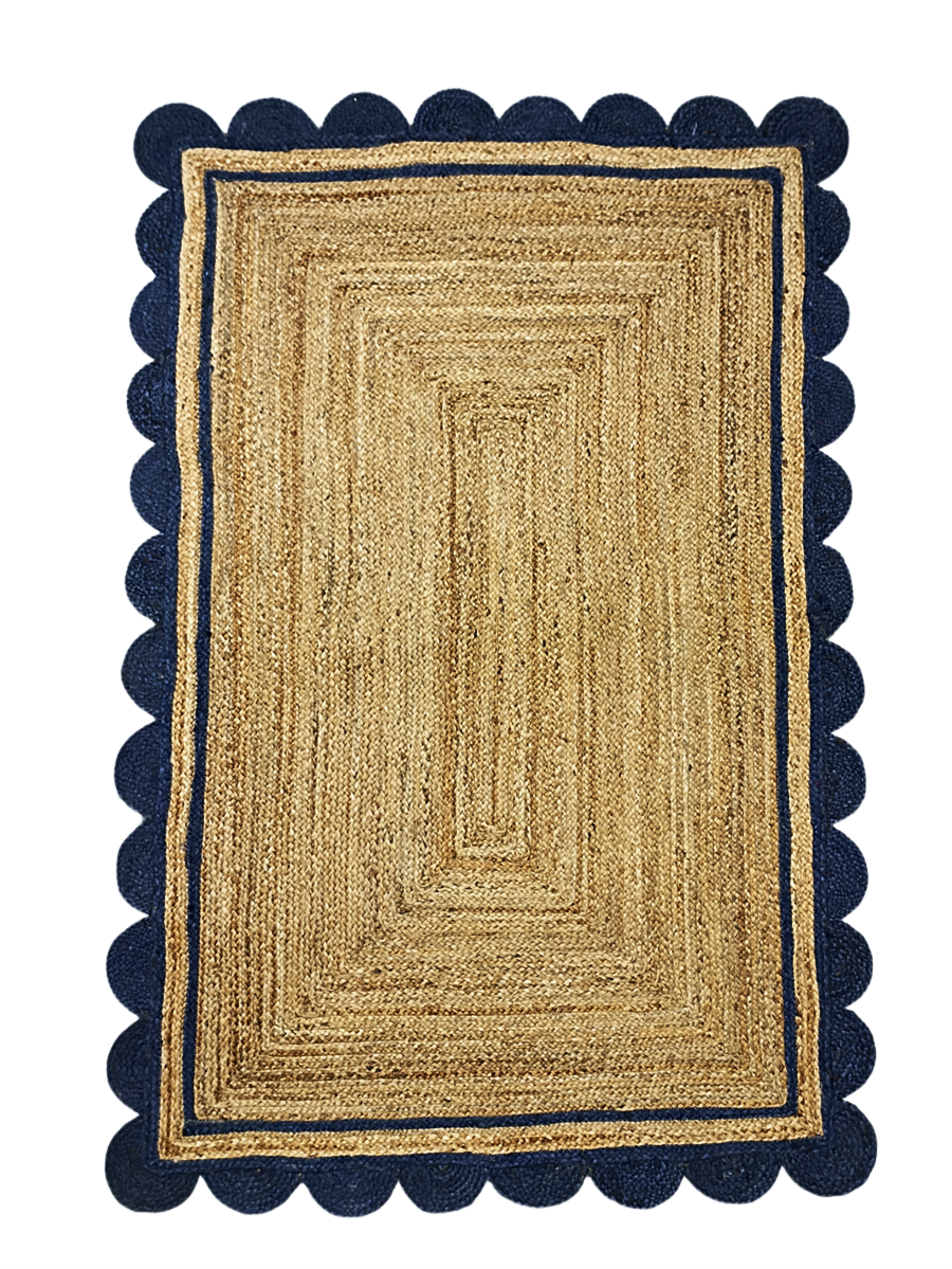 Rectangular jute rug with navy border on a white background