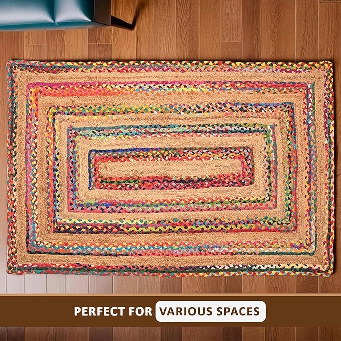 Multicolored braided rug on a wooden floor with text 'Perfect for Various Spaces'.