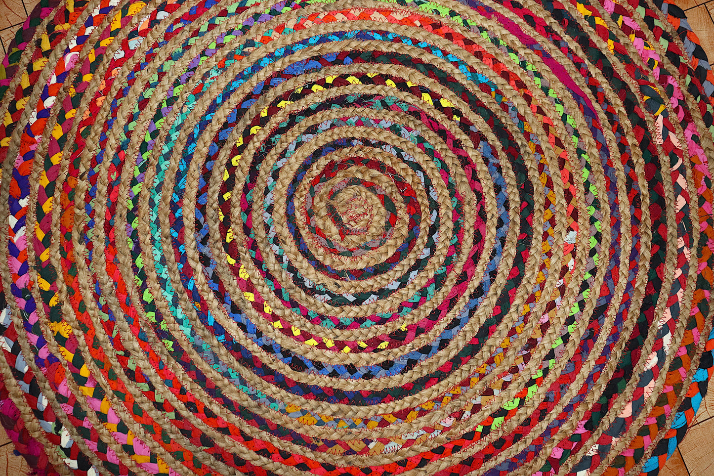 Vibrant Natural Jute Area Rug with colorful braided patterns, perfect for adding texture to any indoor space.
