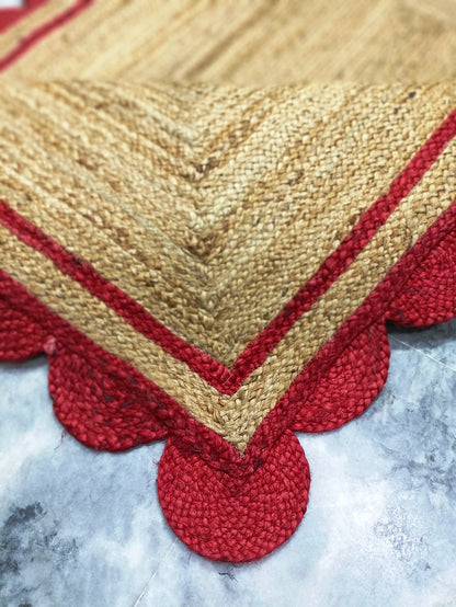 Natural Jute Area Rug with scalloped edges in earthy tones, perfect for adding texture to any living space.