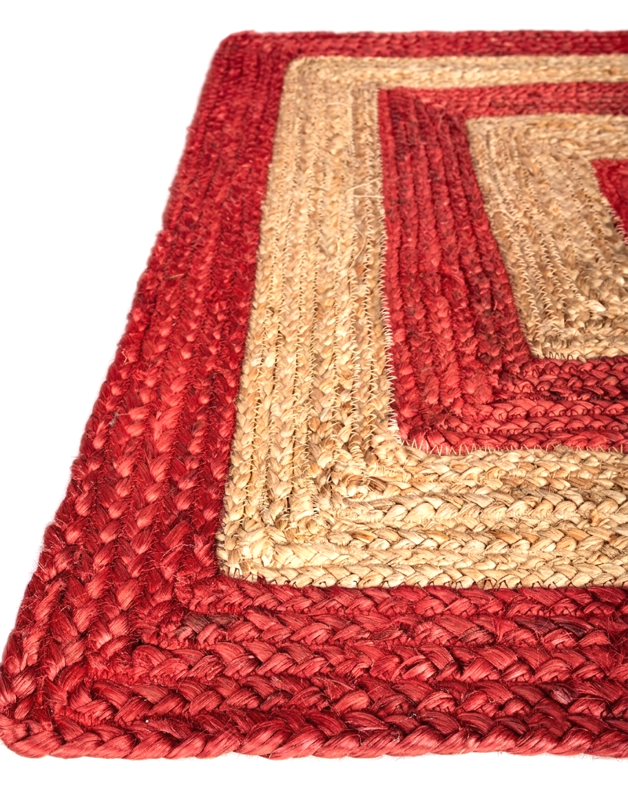 Natural Jute Area Rug with red and beige braided pattern, hand-braided reversible oval area rug texture close-up