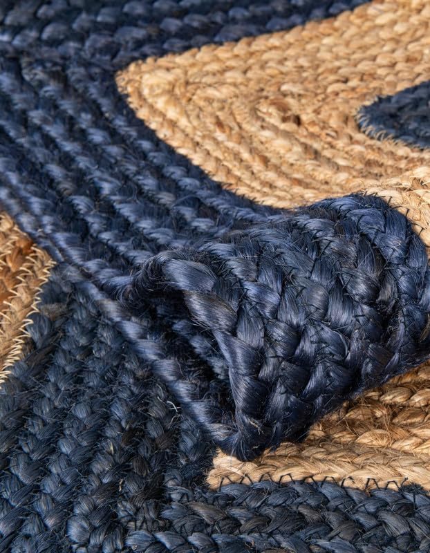 Navy blue and natural jute woven rug with textured braided design for stylish home decor.