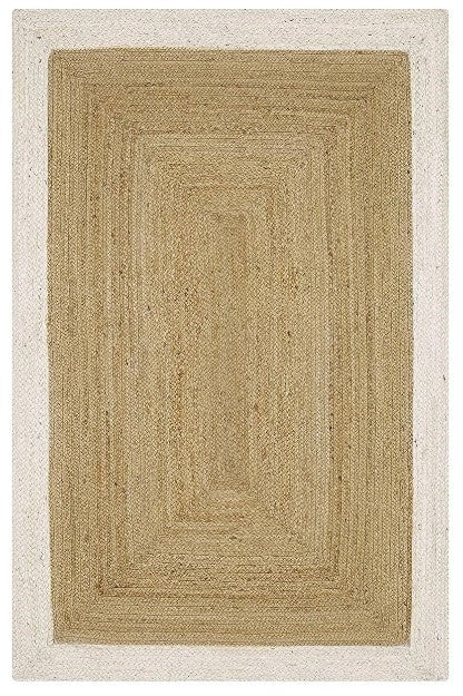 Beige braided rug on a white background