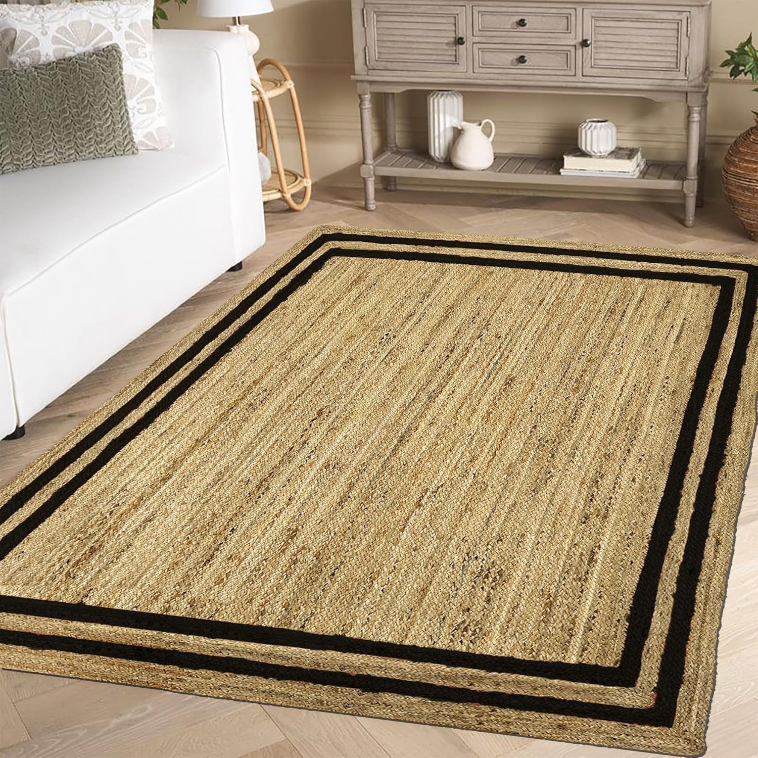 Natural Jute Area Rug with black border, ideal for living room or entryway as a stylish floor carpet.