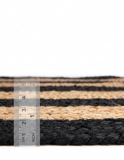 Natural Jute Area Rug floor carpet with black and beige flatwoven texture beside a ruler