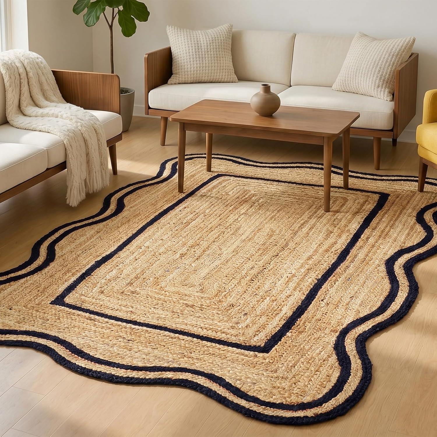 Natural Jute Area Rug with scalloped edges and dark border in a cozy living room setting with modern furniture