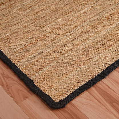 Natural Jute Area Rug floor carpet rug natural jute with black braided edge on wood floor