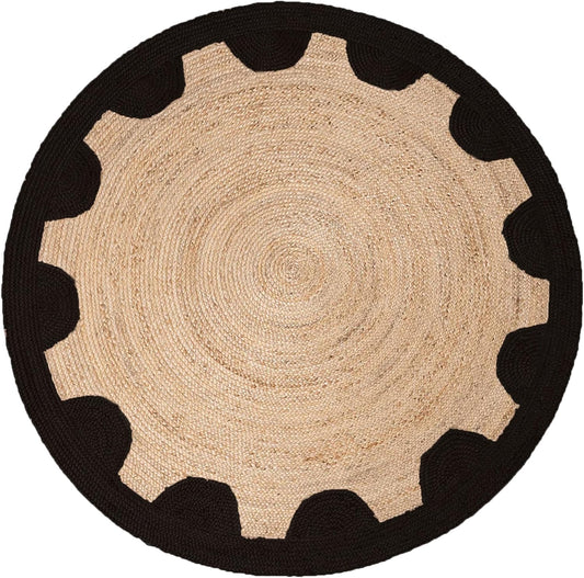 Round rug with beige center and black border on a white background