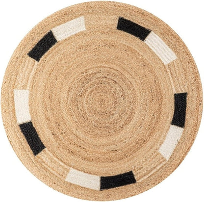 Round jute rug with black and white geometric patterns, ideal for natural decor and modern interiors.