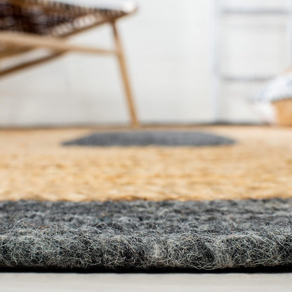 Handwoven jute rug with gray and natural hues, perfect for adding texture to any space.