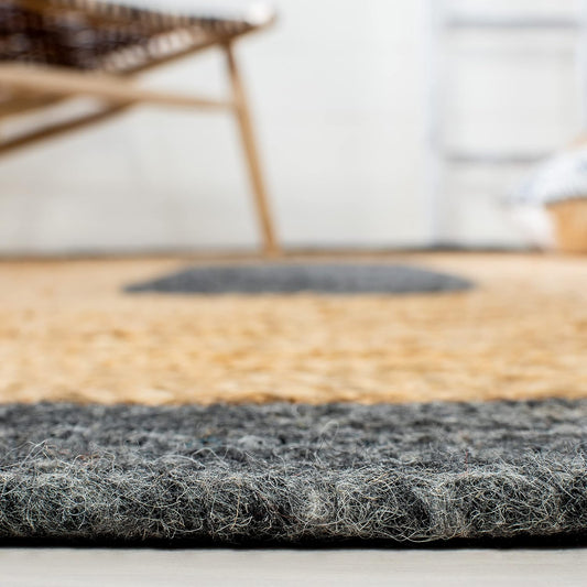 Handwoven jute rug with gray and natural hues, perfect for adding texture to any space.