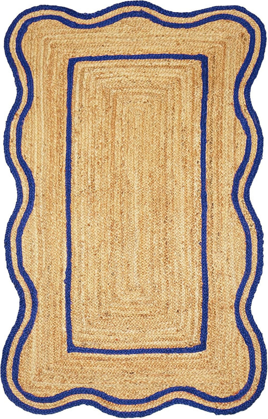 Natural Jute Area Rug with scalloped edges and blue trim, ideal for living room or entryway use.