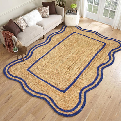 Natural Jute Area Rug with a scalloped edge and blue trim, ideal for living room or entryway decor.