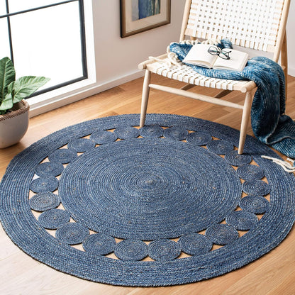 Round navy blue braided rug with decorative circular pattern, perfect for modern home decor.