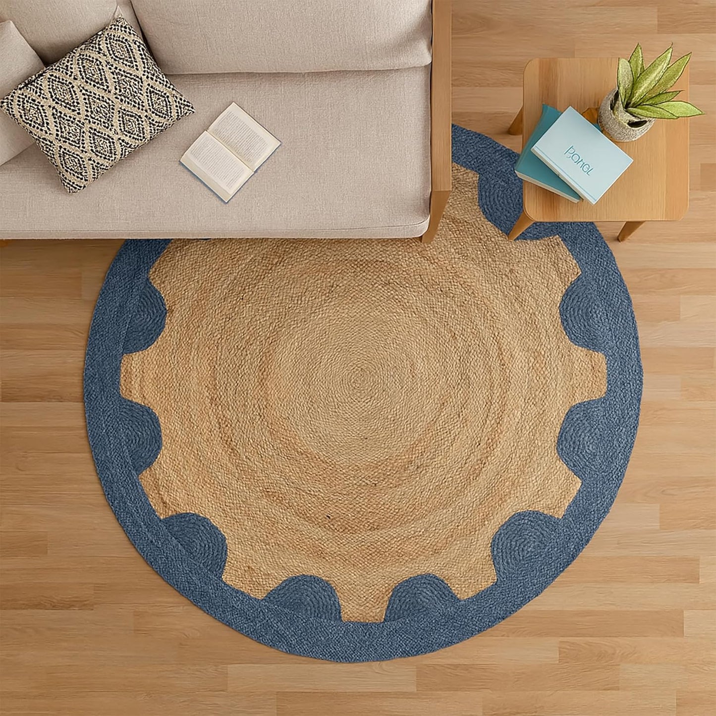 Natural Jute Area Rug in round shape with a blue scalloped border, suitable for living room or entryway.