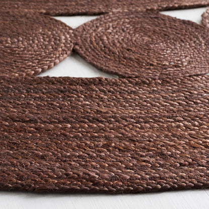 Rustic brown woven jute rug with circular and flat designs, ideal for enhancing home decor.