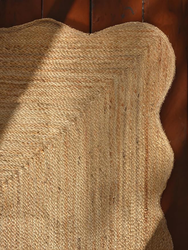 Close-up of a textured beige fabric against a brown background