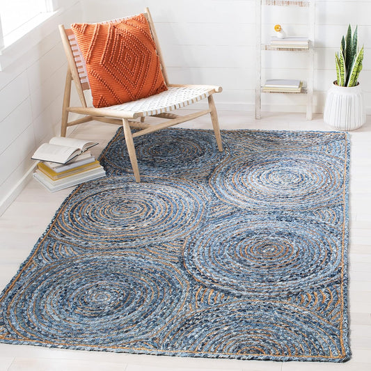 Natural Jute Area Rug in circular patterns with soft blue tones, enhancing a cozy seating area with texture.