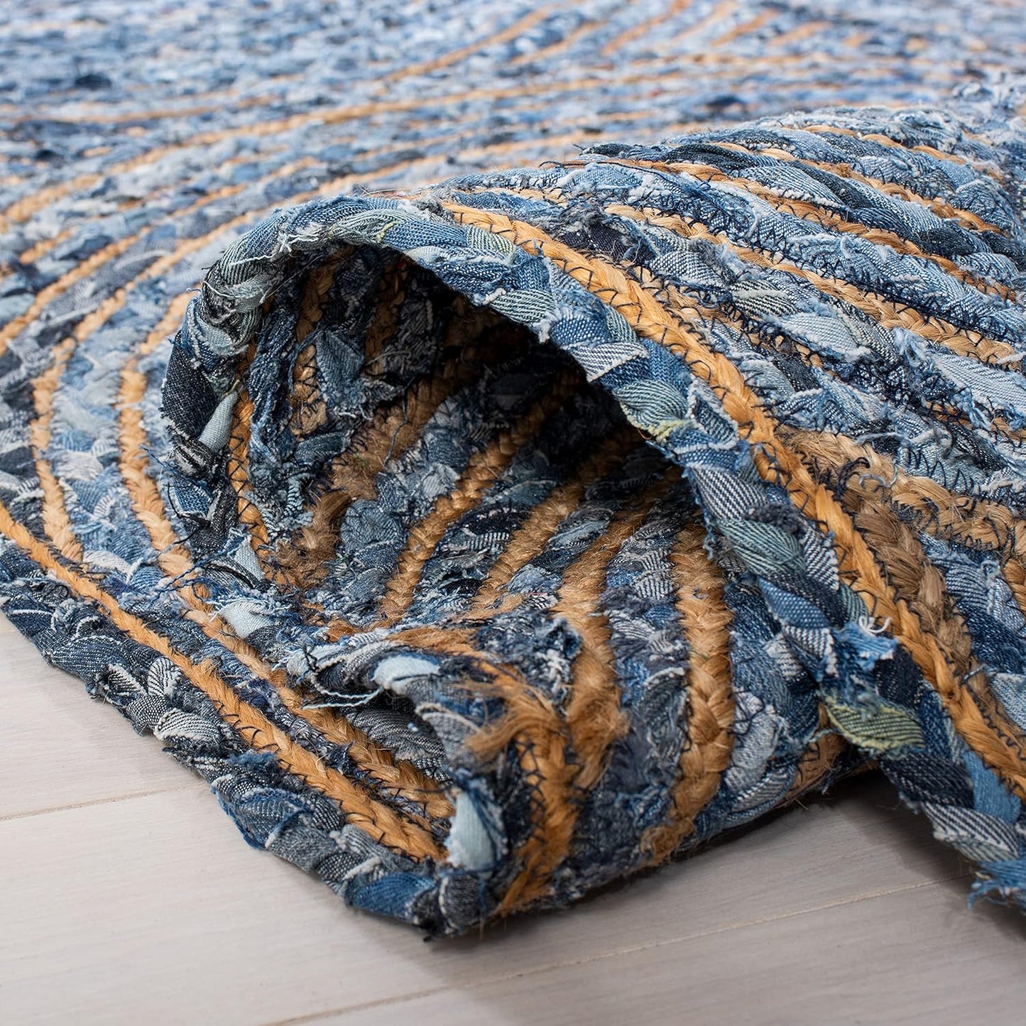 Natural Jute Area Rug in blue and gold tones, featuring a textured weave perfect for enhancing any living space.