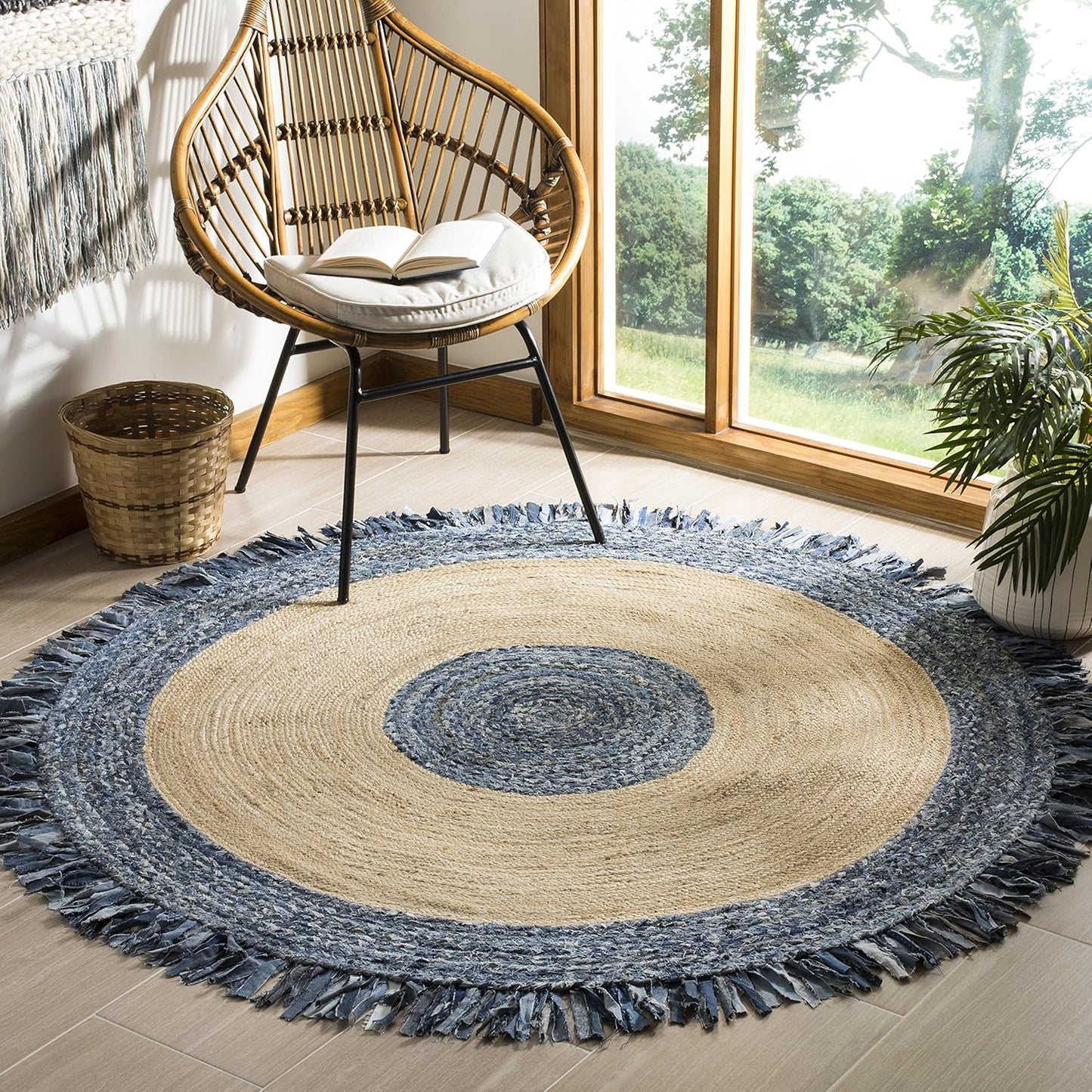 Round blue and beige rug with a chair and window in the background