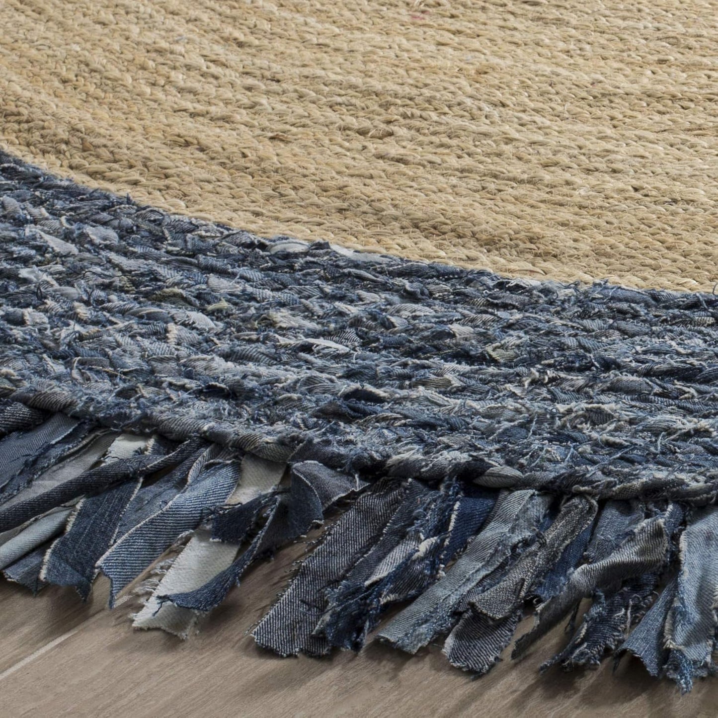 Natural Jute Area Rug with a textured blue denim fringe — a versatile floor carpet perfect for any room.