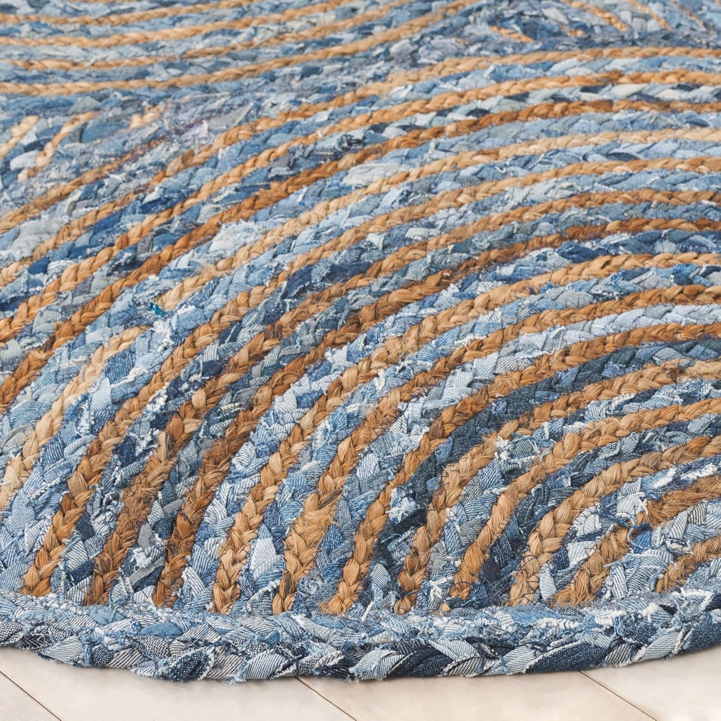Natural Jute Area Rug in shades of blue and tan, featuring a textured braided design for a cozy, inviting feel.