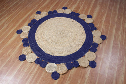 Natural Jute Area Rug with a round shape and scalloped edges, adding texture to your living space.