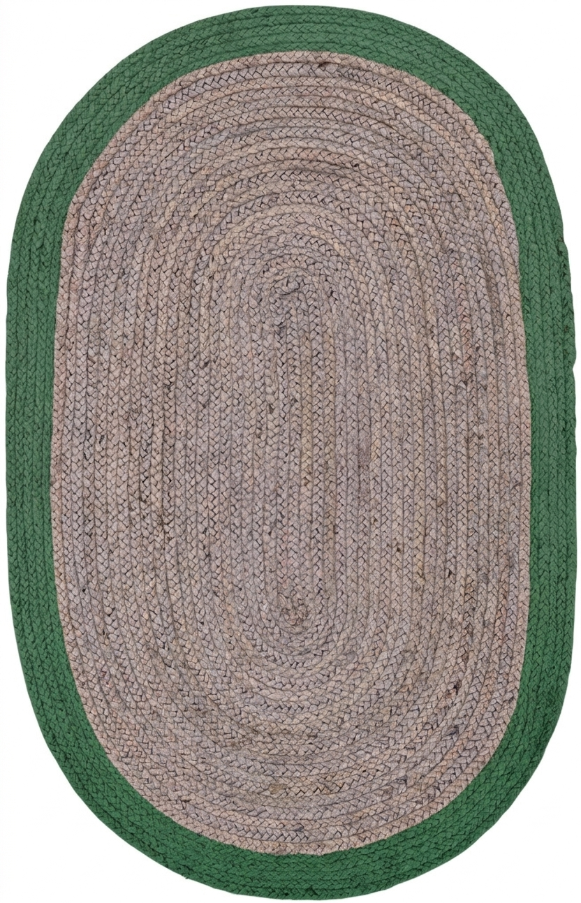 Oval braided rug with green border on a white background
