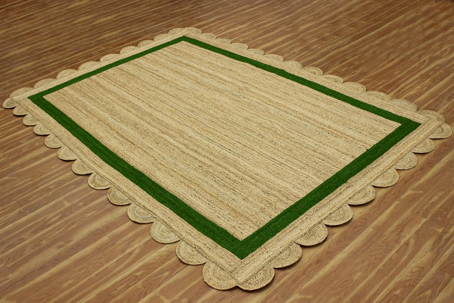 Natural Jute Area Rug with scalloped edges and a green border, perfect for enhancing indoor spaces.